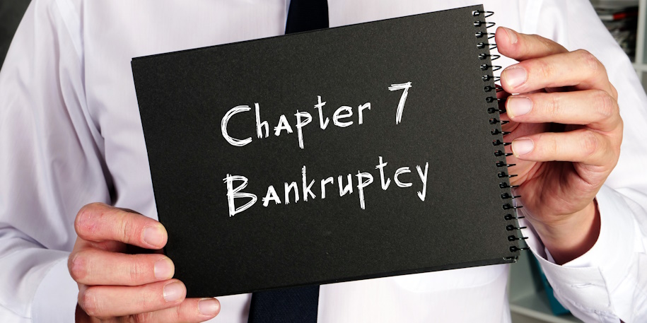 chapter 7 bankruptcy written on notebook chapter 7 bankruptcy written on notebook