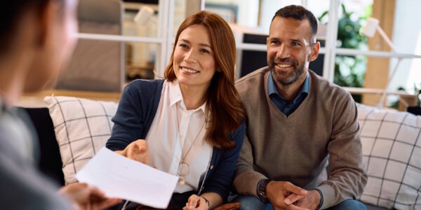 couple discussing bank consolidation options with attorney