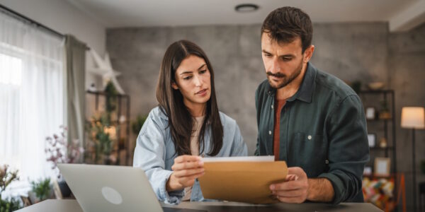 couple looking over loan paperwork
