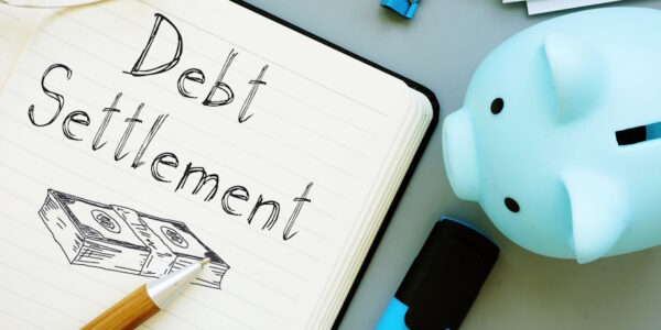 Debt Settlement is shown on the business photo using the text Debt Settlement is shown on the business photo using the text