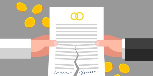 divorce finances arms from two different people rip apart a marriage document with coins flying out