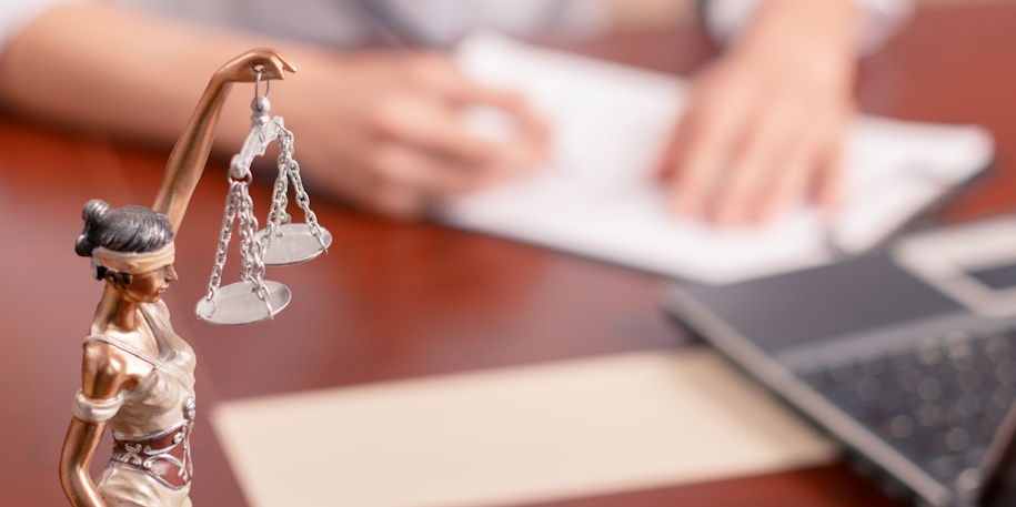 lady justice on lawyers desk lady justice on lawyers desk
