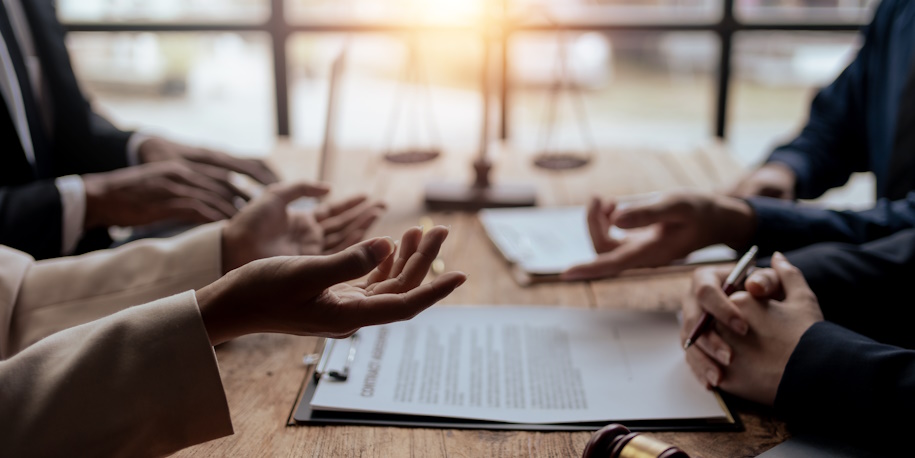 lawyer discussing debt relief options lawyer discussing debt relief options