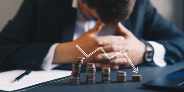 man looking defeated with the loss of his money