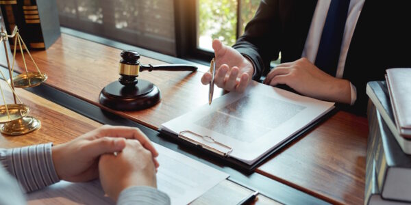 man consulting with lawyer