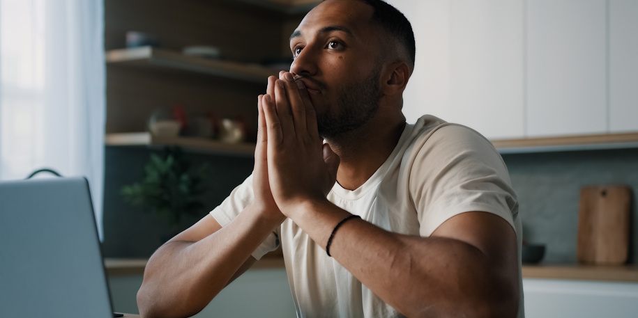 man stressed on computer