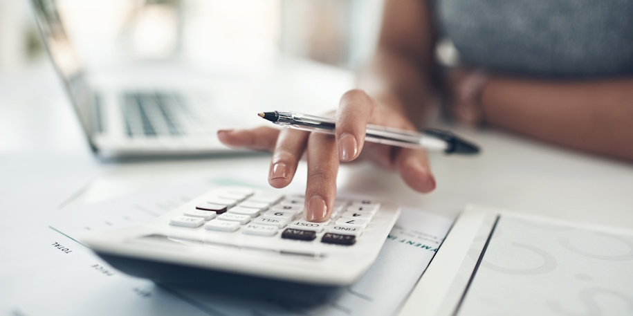 woman using calculator